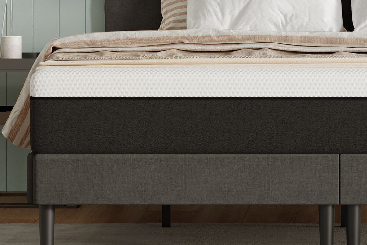 Image of the bottom of a bed featuring the emma premium hybrid mattress.