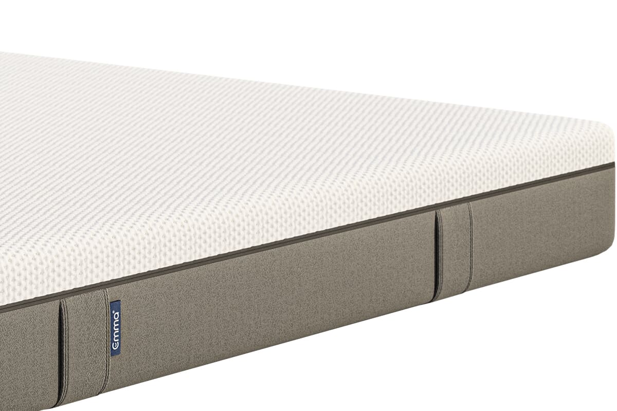 Close up of the side and corner of the Emma® Premium Memory Hybrid Mattress.