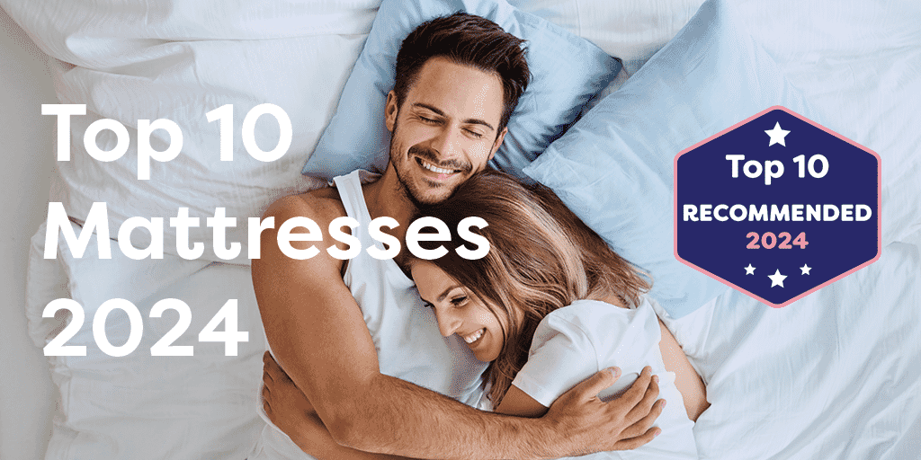 Image of a couple cuddling in bed with the top ten logo overlayed next to them.