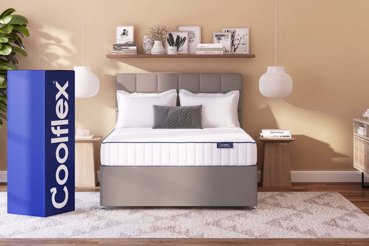 Coolflex mattress on divan bed with box next to it.