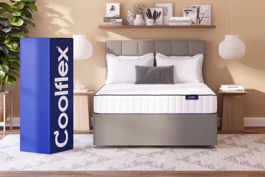 Image of the coolflex essentials on a divan bed in a bedroom with a mattress box next to it.