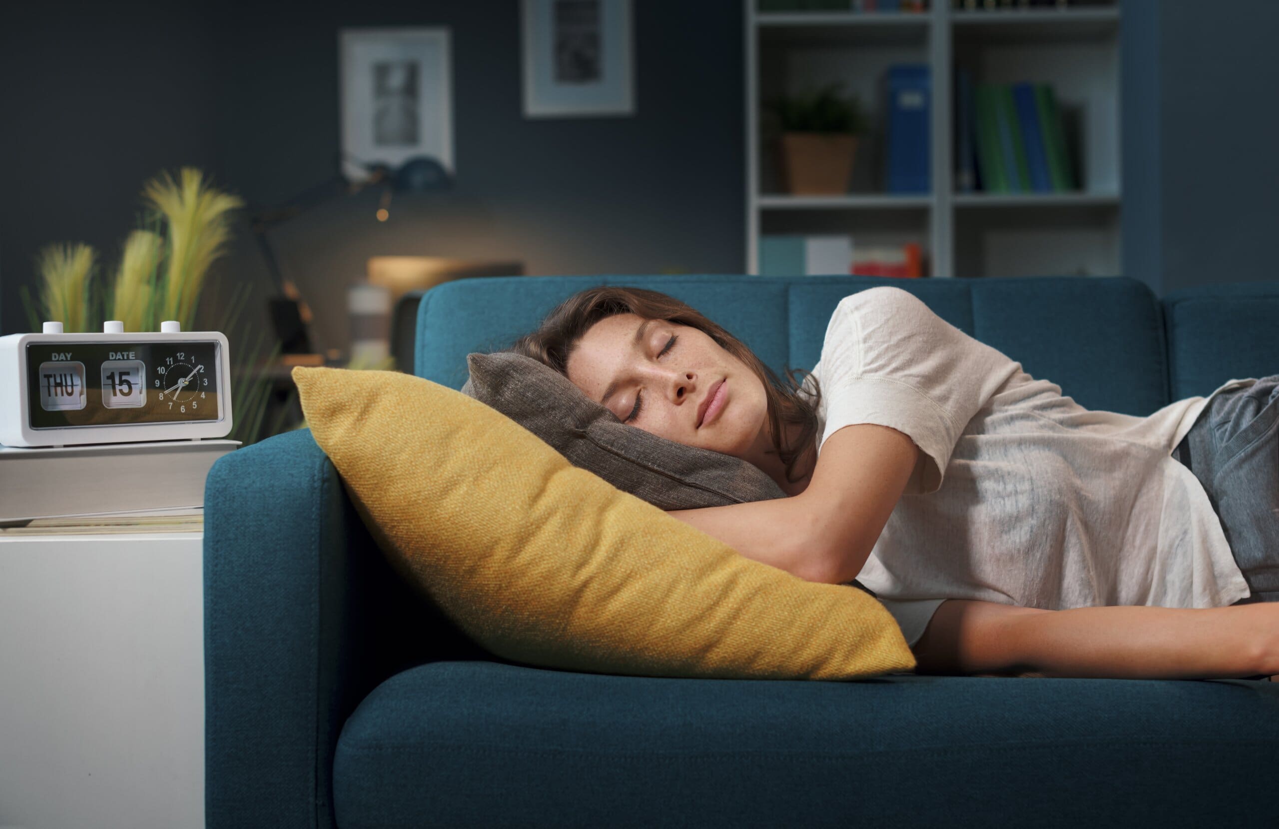 Woman sleeping on a sofa.