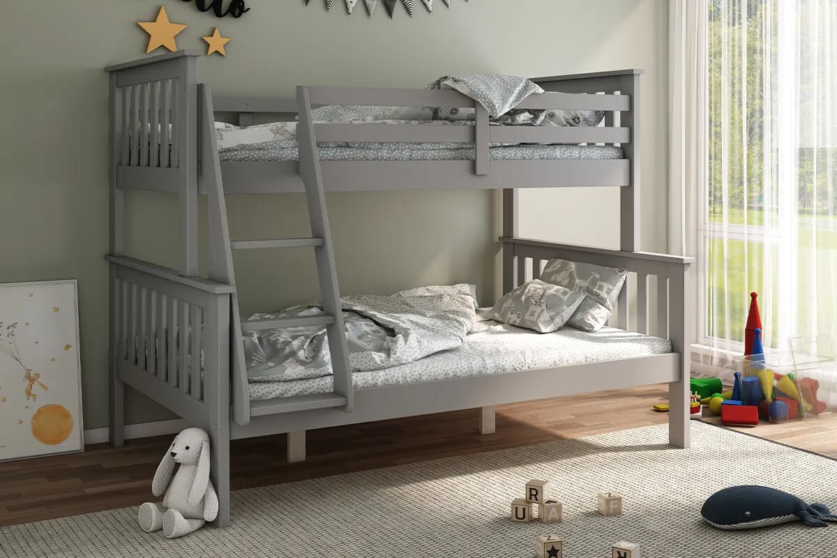 Grey triple sleeper bunk bed in a children's bedroom.
