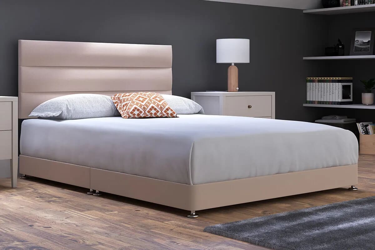 Image of a beige low divan bed in a bedroom setting.