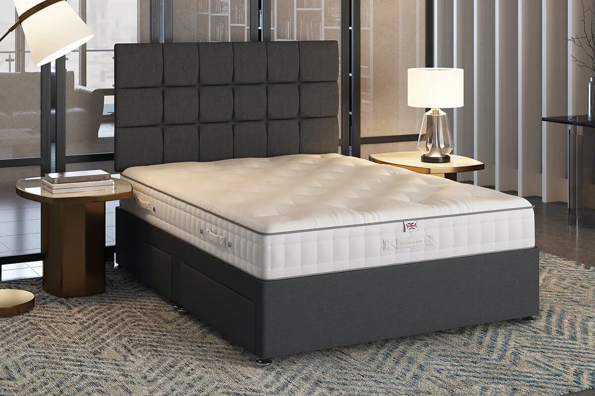 Image of no-turn mattress on black divan bed.