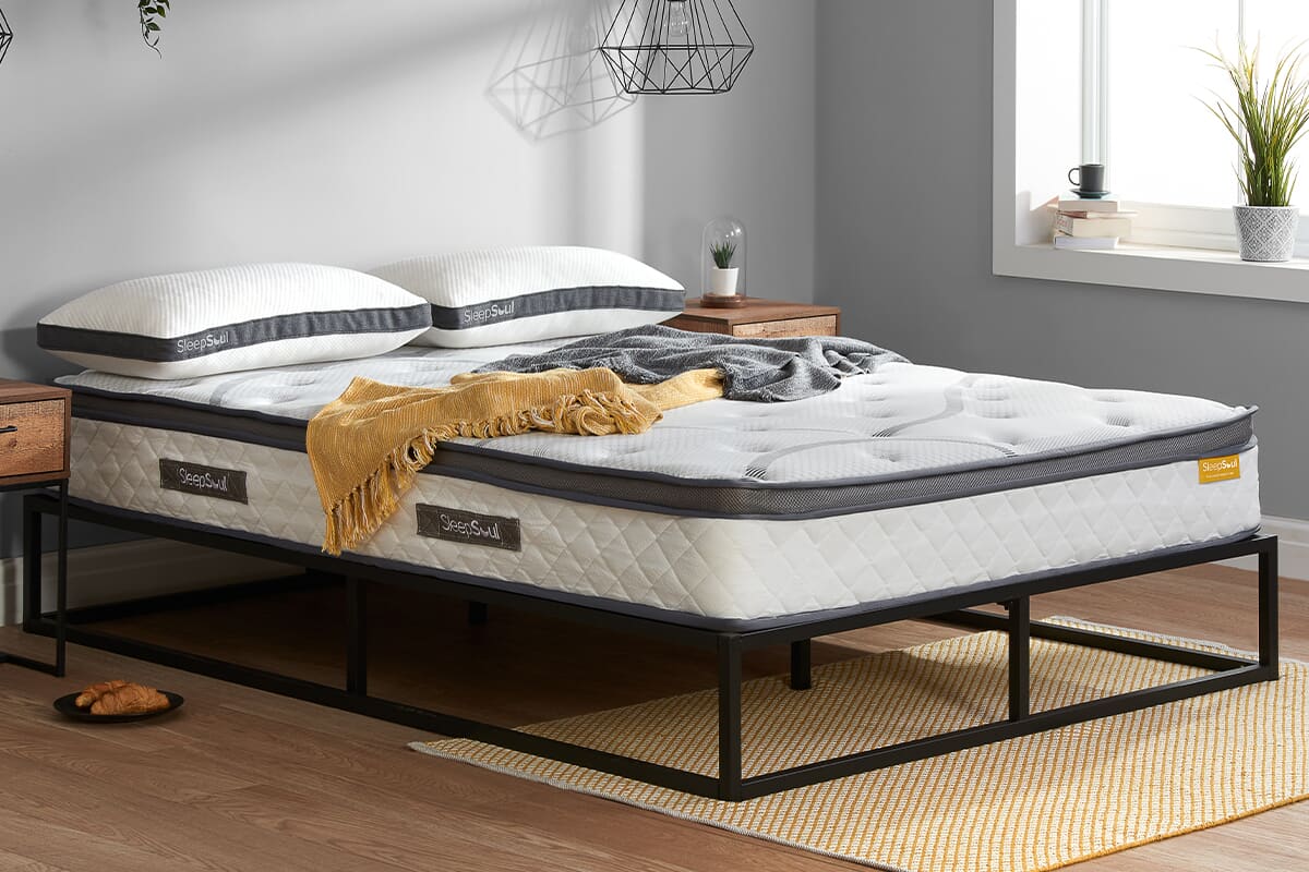 Image of the SleepSoul mattress on a simple black bed frame.