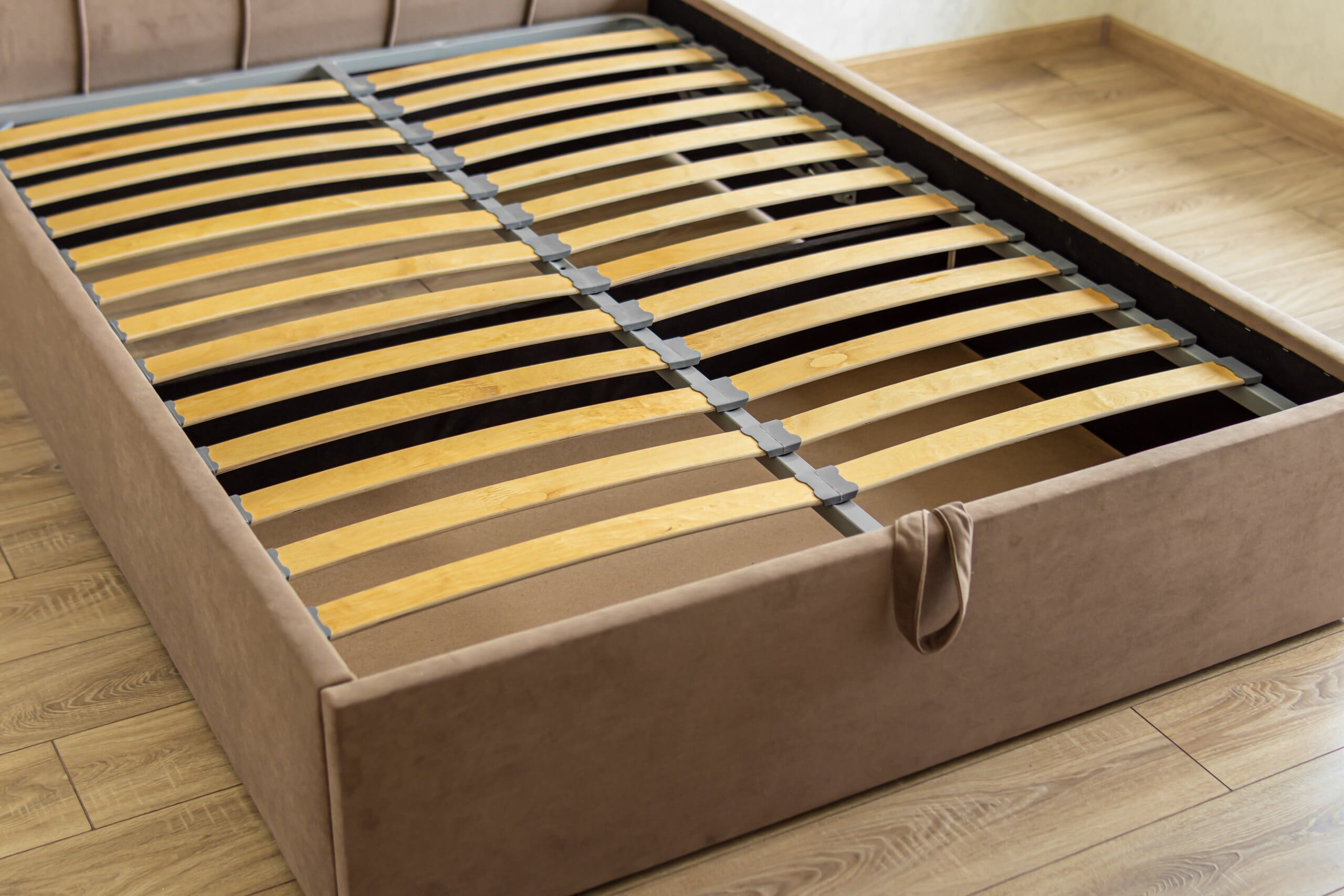 Close up of a bed with sprung slats.