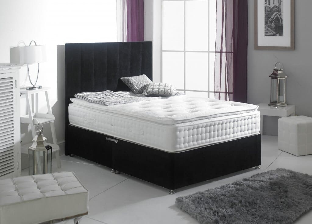 A Spring King Sanctuary Spa 2000 Pillow Top Mattress on a bed