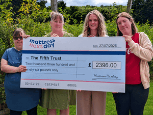 Cheque presented to The Fifth Trust.