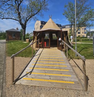 The Fifth Trust Tipi exterior with accessable ramp.