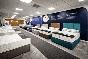 MattressNextDay showroom featuring Emma mattress and premium bed collections