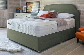 A product image for the Rest Assured British Wool 2000 Pocket Firmer Mattress
