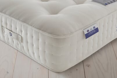 An image for Rest Assured Northington 2000 Pocket Natural Mattress + Premium Divan Bed