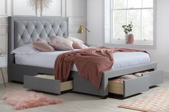 A product image for the Woodbury Grey Fabric 4 Drawer Storage Bed