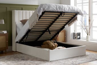 A product image for the Maisey Cream Fabric Ottoman Bed
