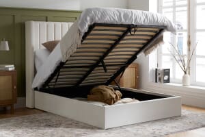 A product image for the Maisey Cream Fabric Ottoman Bed