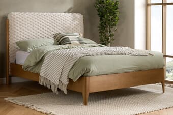A product image for the Hatti White Fabric Bed