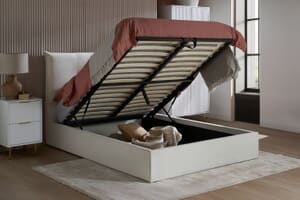 A product image for the Haven White Fabric Ottoman Bed